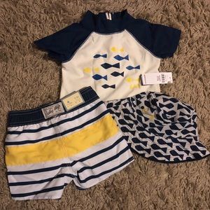 Baby boy swim trunks, rash guard, and hat